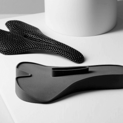 A demonstration of the possibilities of 3D printing - a saddle design using honeycomb structures.